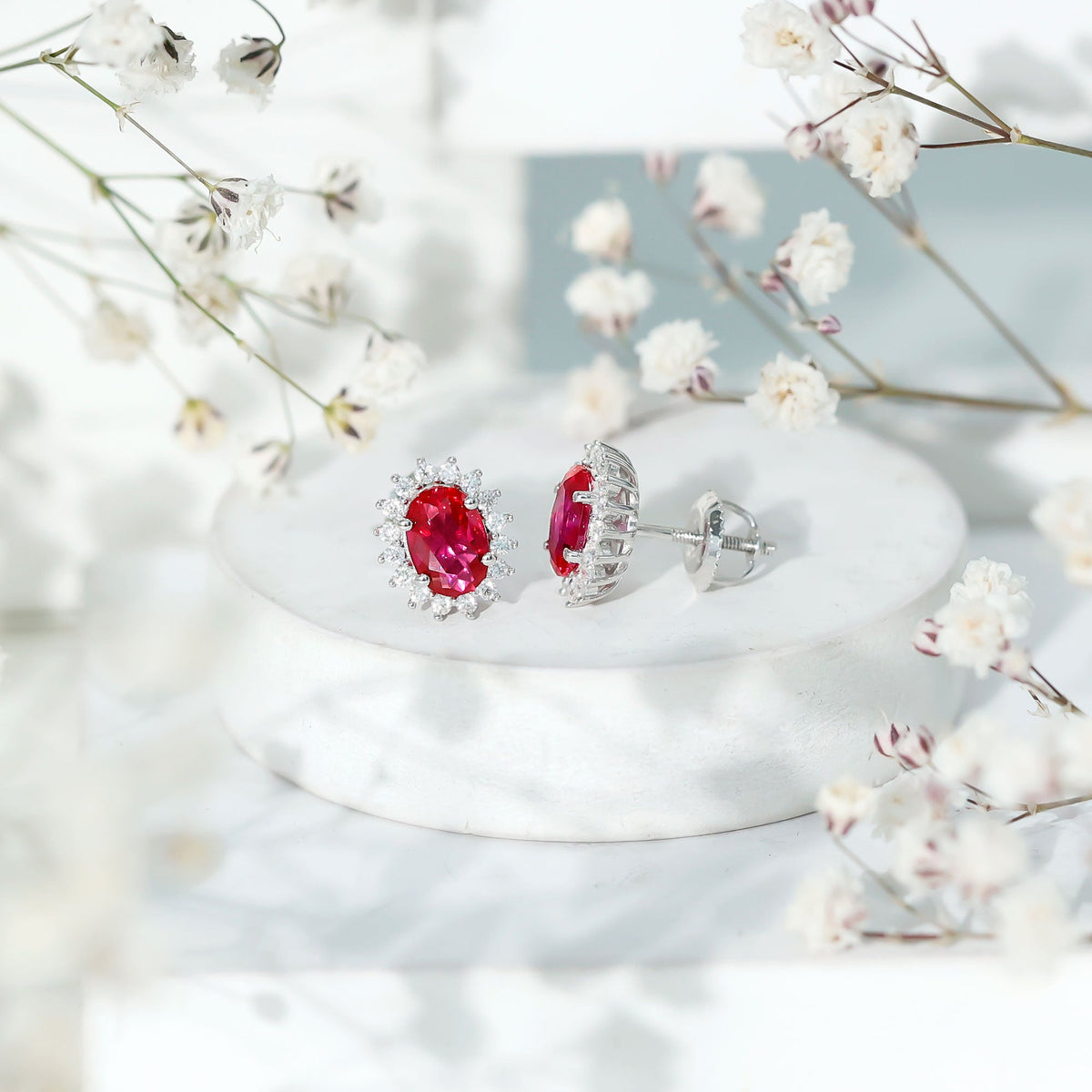 2 Carat Oval Cut Lab Grown Ruby Halo Stud Earrings in Silver
