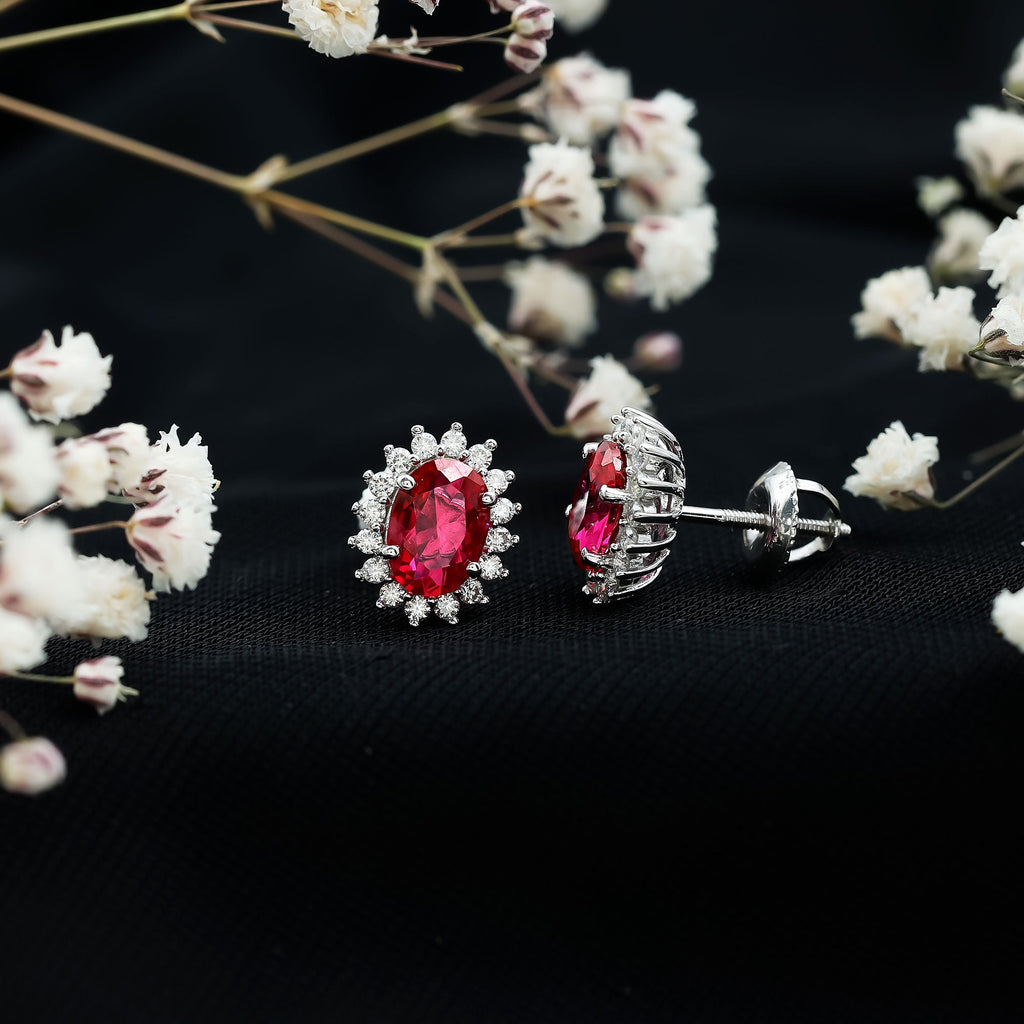 2 Carat Oval Cut Lab Grown Ruby Halo Stud Earrings in Silver